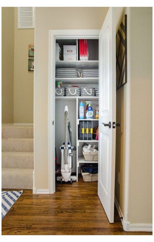 hallway storage closet with vacuum
